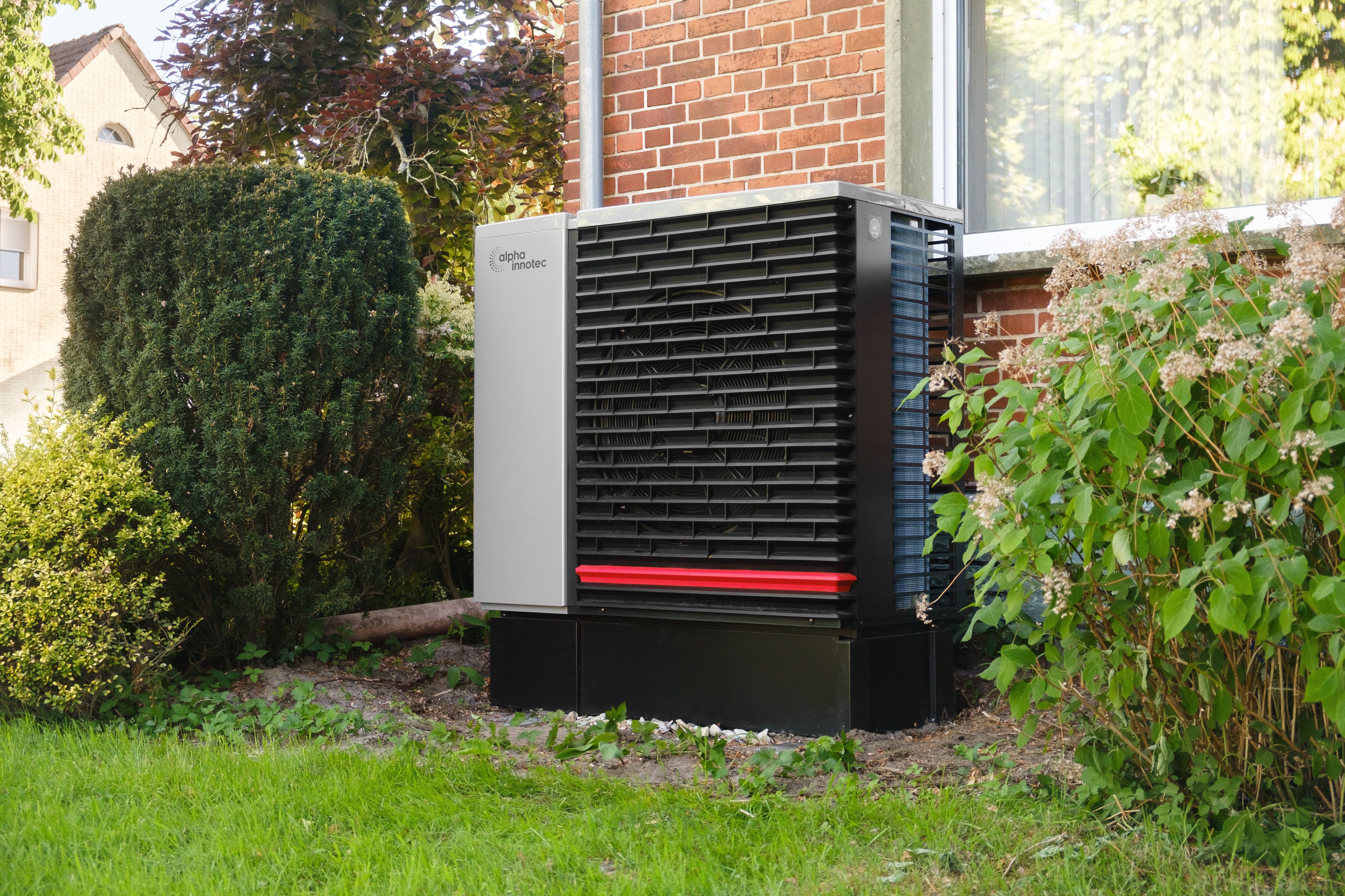 Heat pump outdoor unit installed at residential home